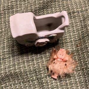 Vintage baby doll carriage figurine